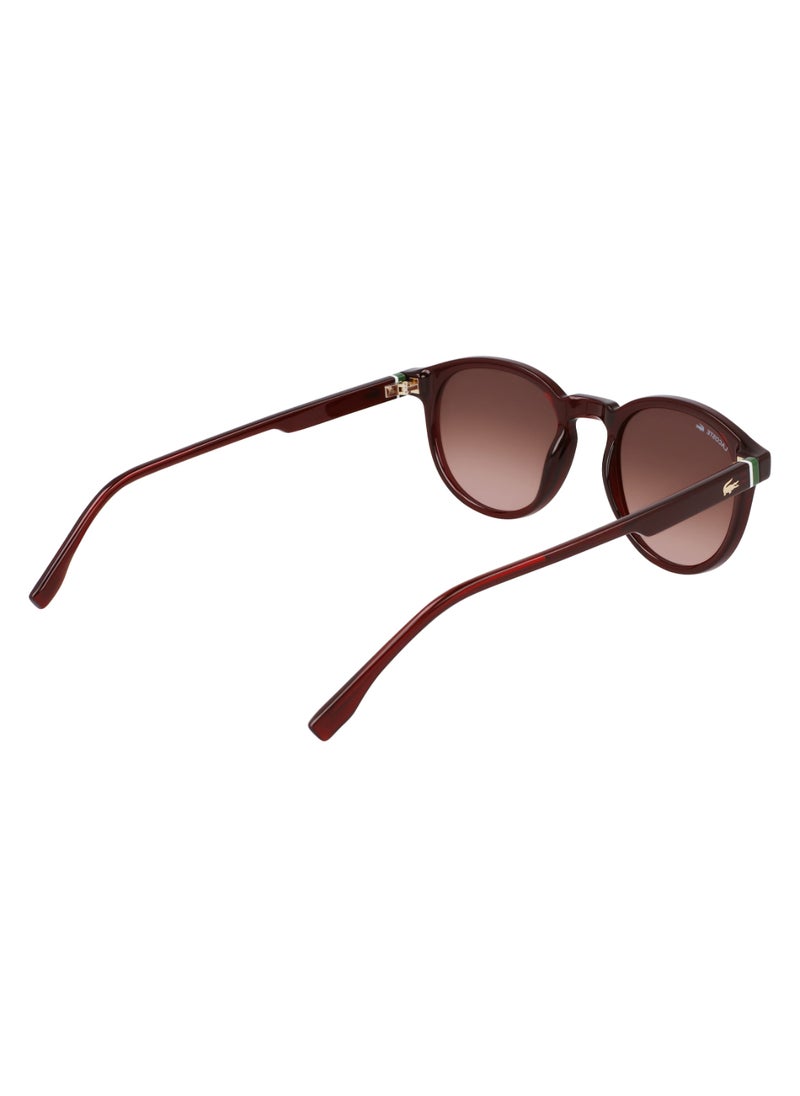 LACOSTE - FULL RIM BIO INJ-G820 ROUND LACOSTE SUNS L6030S  5021 (601) TRANSPARENT BURGUNDY - Image 1