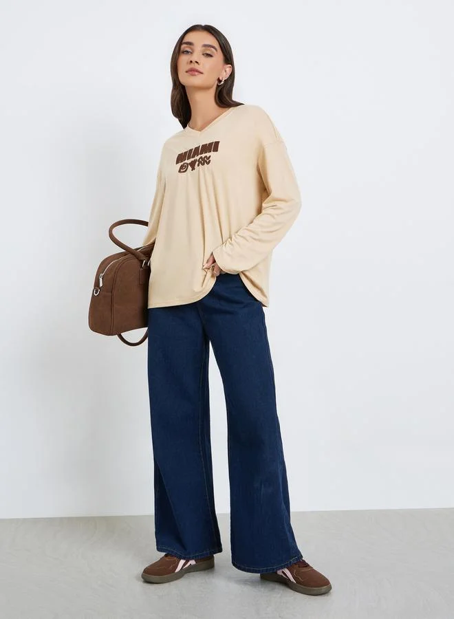 ستايلي تيشيرت مطرز بقصة واسعة