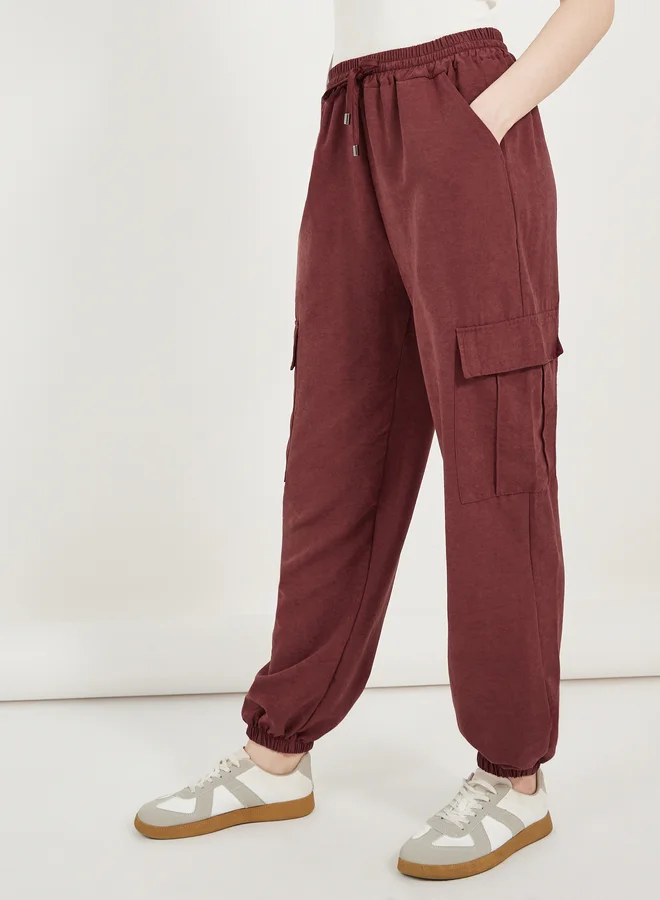 ستايلي Oversized Pocket Shirt and Cuffed Joggers Co-Ords