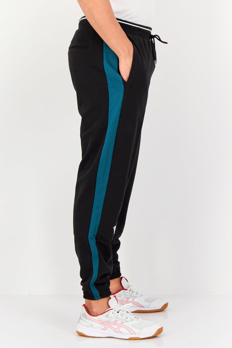 PUMA Men Sportswear Fit Brand Logo Outdoor Sweatpants, Black - Image 3