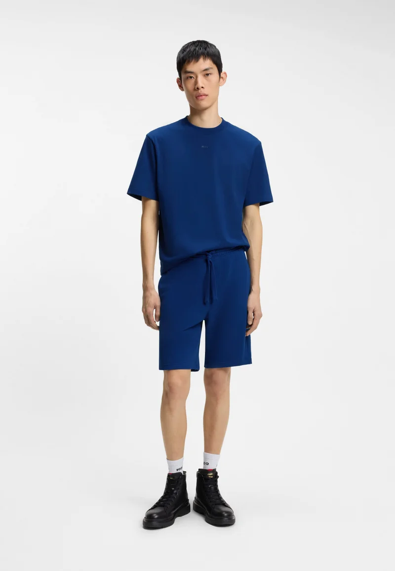 HUGO  Relaxed-fit T-shirt in cotton jersey with logo print for Men | Best Price UAE