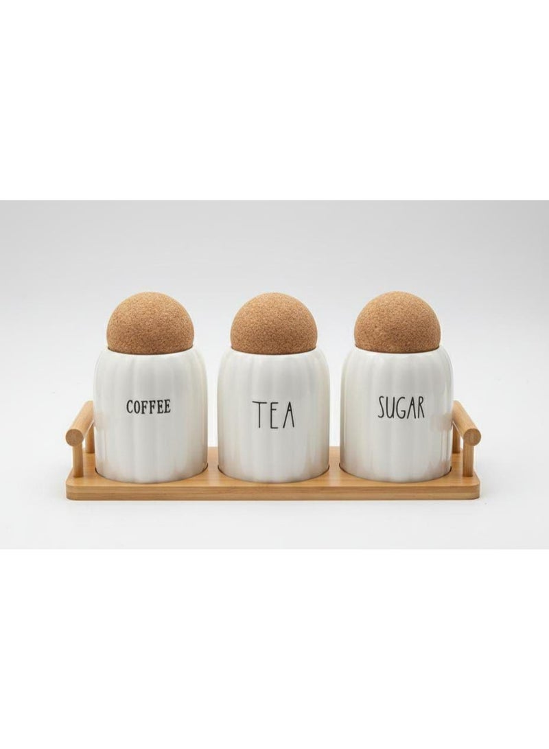 Porcelain Spice Set with Rope Multi-purpose set suitable for spices like salt, pepper, and chili, as well as for tea, coffee, and sugar. Set includes:  3 porcelain spice jars  Natural bamboo lid  Rectangular wooden tray Jars capacity approximately 350 ml