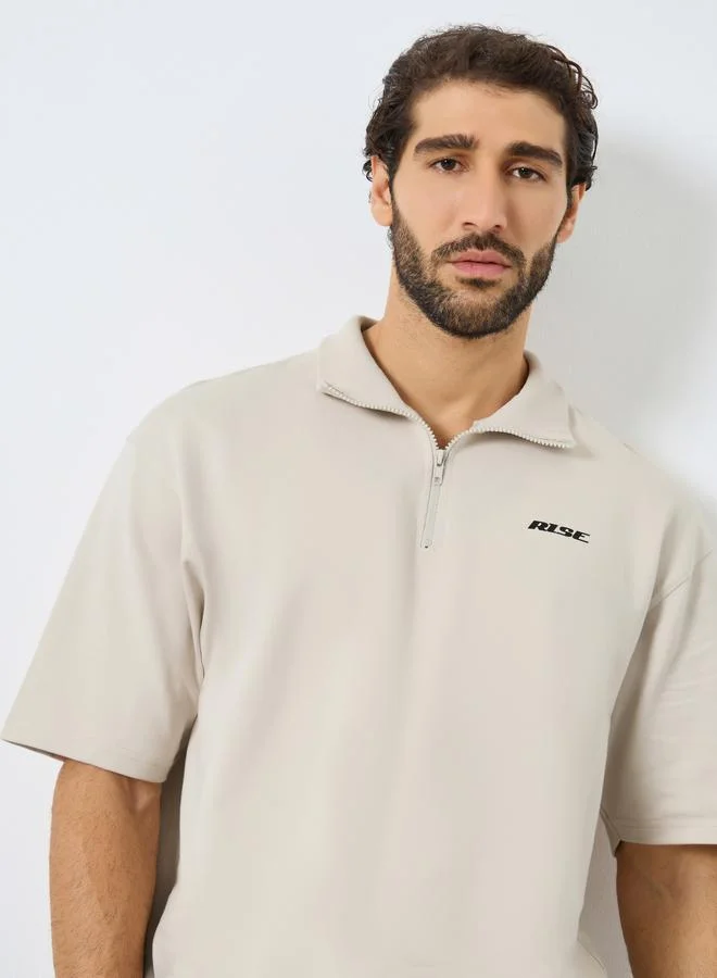 Styli Men Relaxed Fit Quarter Zip Polo