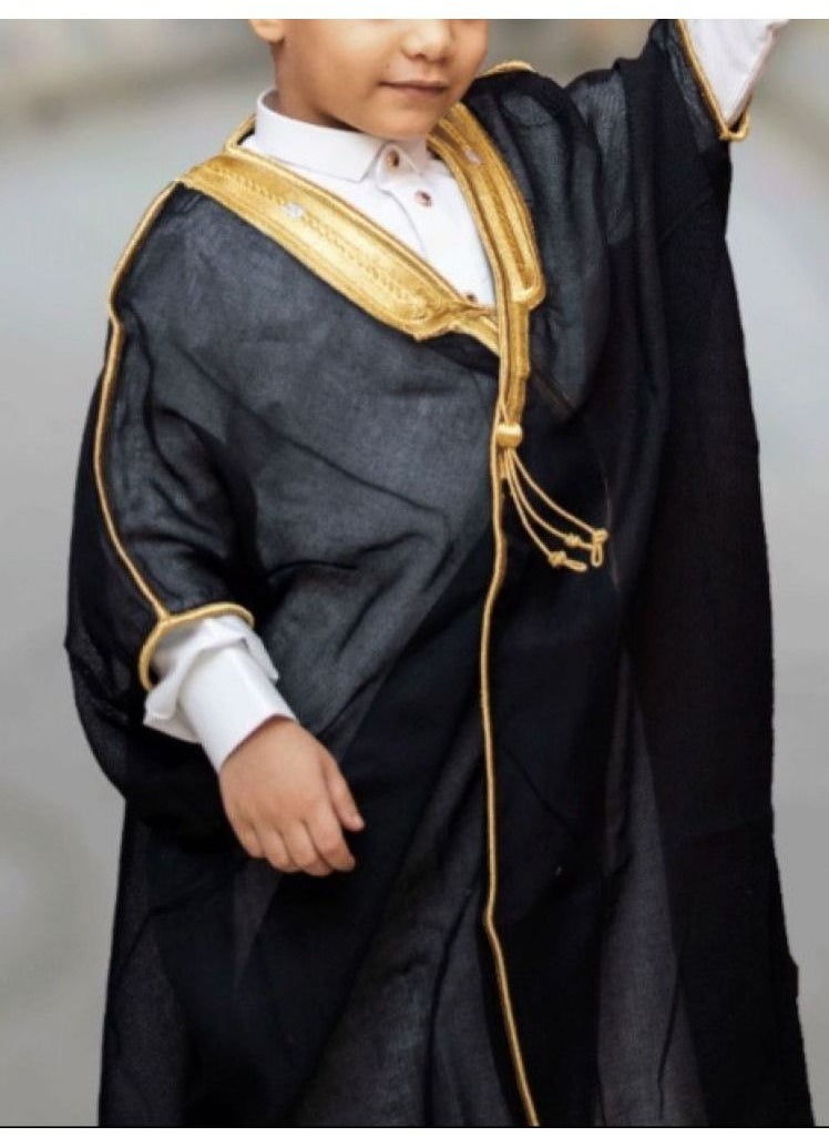 Generic - A boy's bisht, black, golden, luxurious, royal, woolen, the bisht or the mushalh has a long-standing connection with the Gulf man, as it is not a traditional dress, but rather a special wear that is u - Image 1