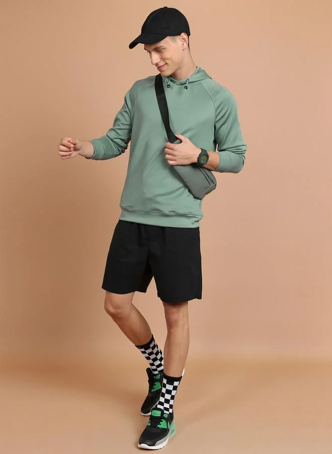 HIGHLANDER Solid Raglan Sleeves Drawstring Hoodie by Styli