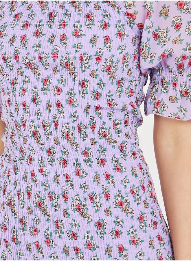ستايلي Ditsy Print Smocked Detail Mermaid Hem Midi Dress