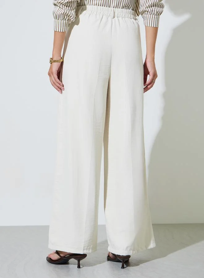 Styli Cream Cream Wide Leg with Pleat Detailing Formal Pants for Women | Best Price UAE
