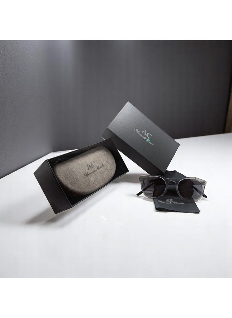 Armando Cavelli - Authentic Armando Cavalli sunglasses, crafted from carefully selected premium acetate for a luxurious look and longevity with extensive use. This model combines modernity and classic style, with a raw transparent light grey acetate front and gunmetal -plated metal temples to complete your luxury look. Comes with premium polymer lenses offer UV400 protection in a gradient dark grey - Image 1
