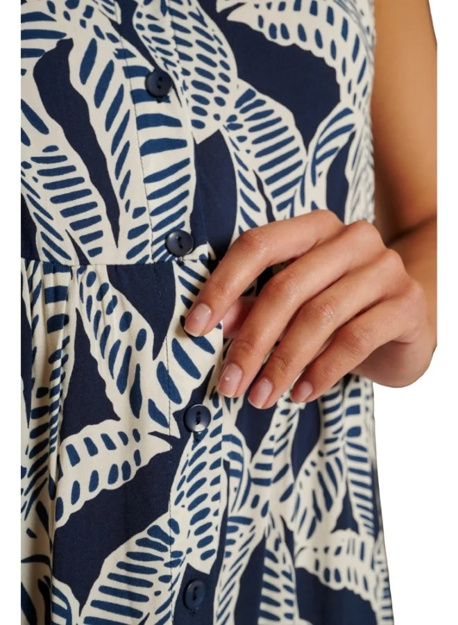 زابايوني Elegant blue midi dress with white leaf prints, perfect for casual or semi-formal events.