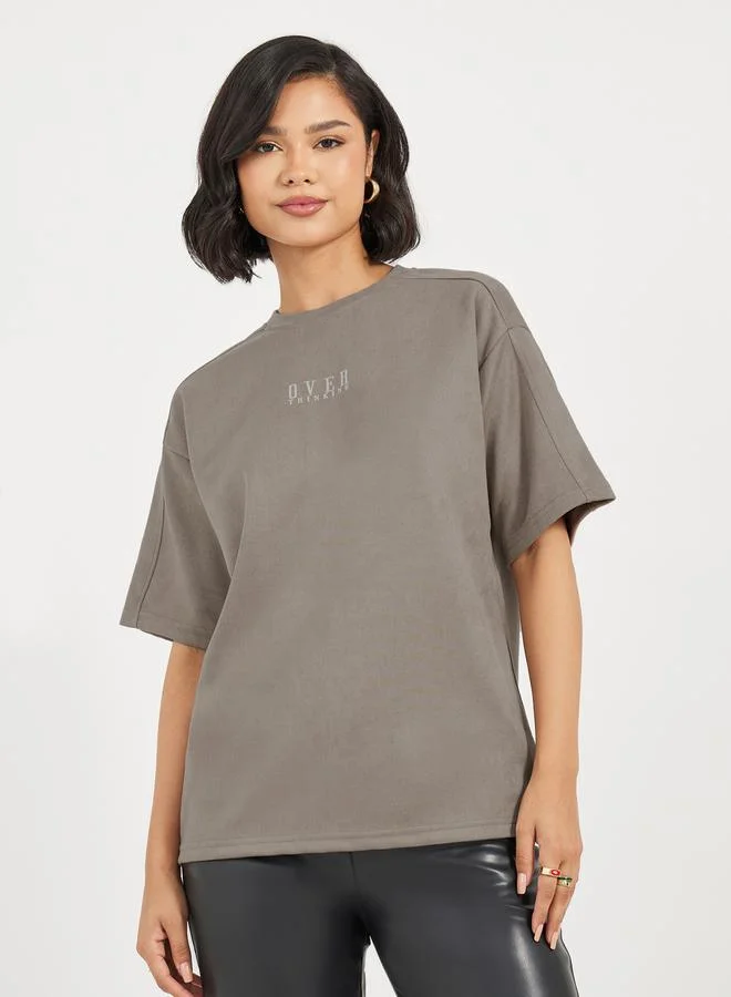 Styli Oversized Suede Look Overthinking Slogan T-Shirt