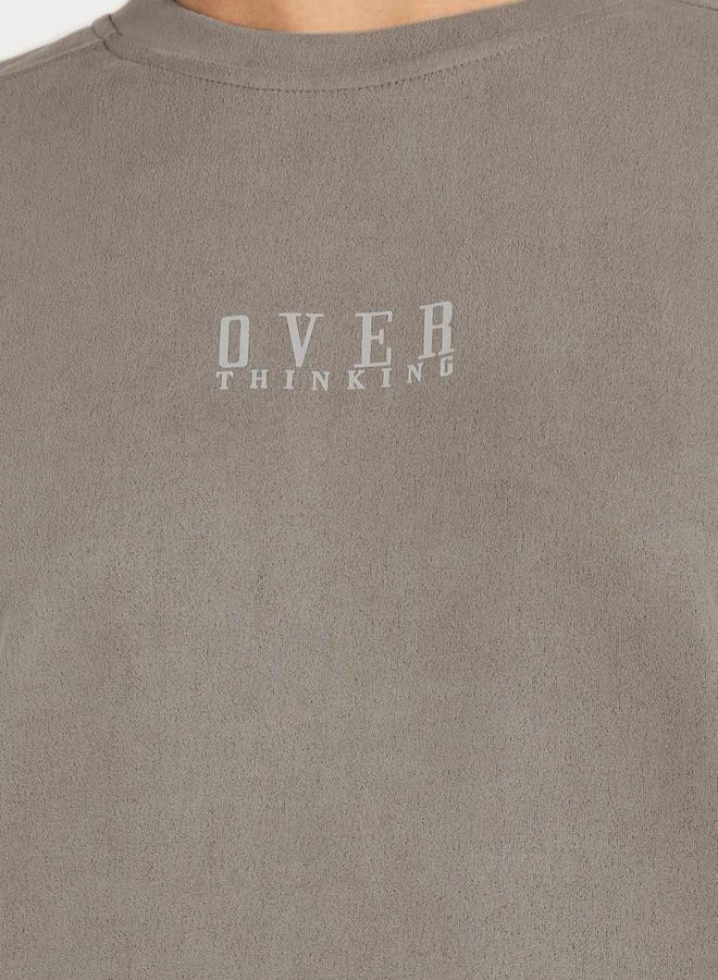 Styli Oversized Suede Look Overthinking Slogan T-Shirt