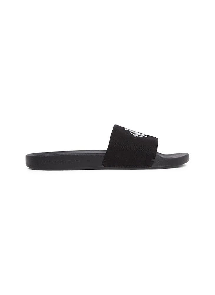 Calvin Klein Jeans Monogram One Strap Flip Flops
