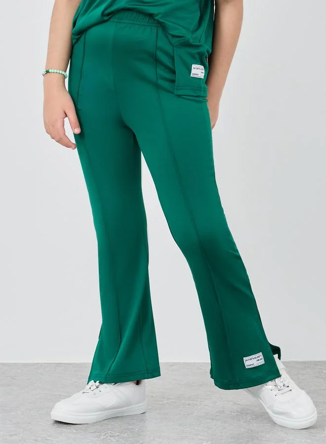 Styli Styli Patch Detail Oversized T-Shirt and Flared Leggings Set
