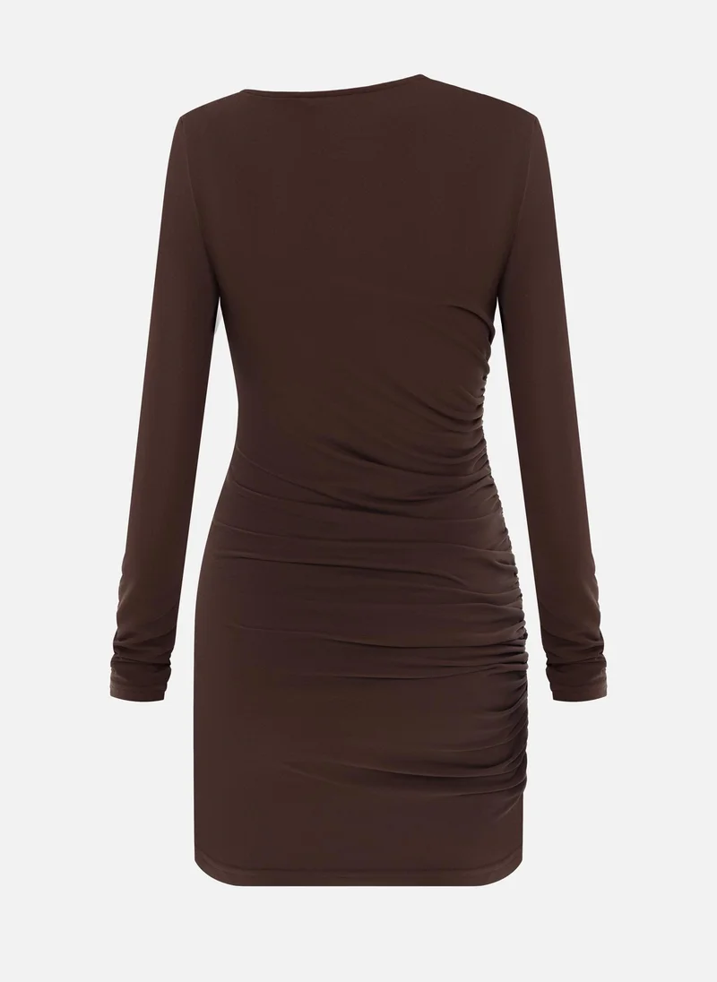 Lichi Jersey mini dress with long sleeves and gathering at the side seam