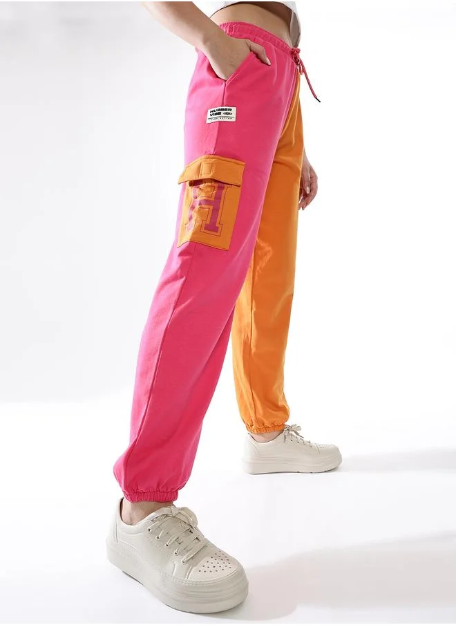 هوبرهولمي Women Track Pants in Multicolor featuring Jogger fit with a colourblocked pattern, no sleeves, regular length, secured with elasicated + drawstring closure, crafted from terry – a must-have for those who love trendy fashion.