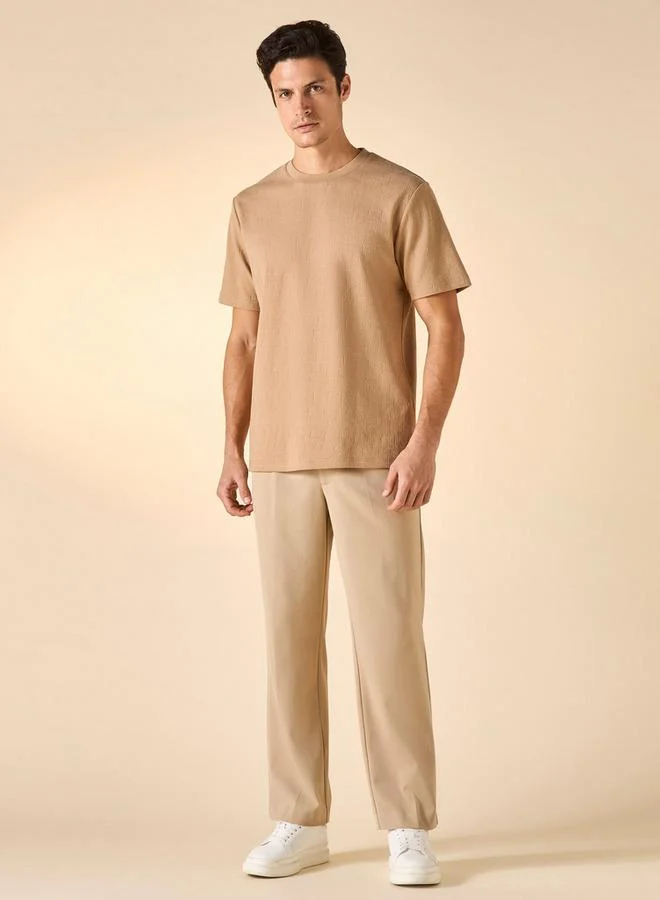 ايكونيك تيشيرت بارز الملمس بأكمام قصيرة من آيكونيك