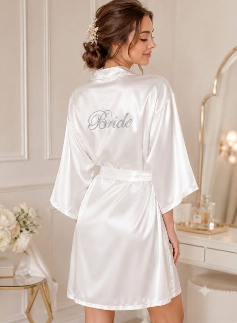 A short white bridal robe—soft and elegant, featuring the word "Bride"—perfect for wedding preparations. - Image 1