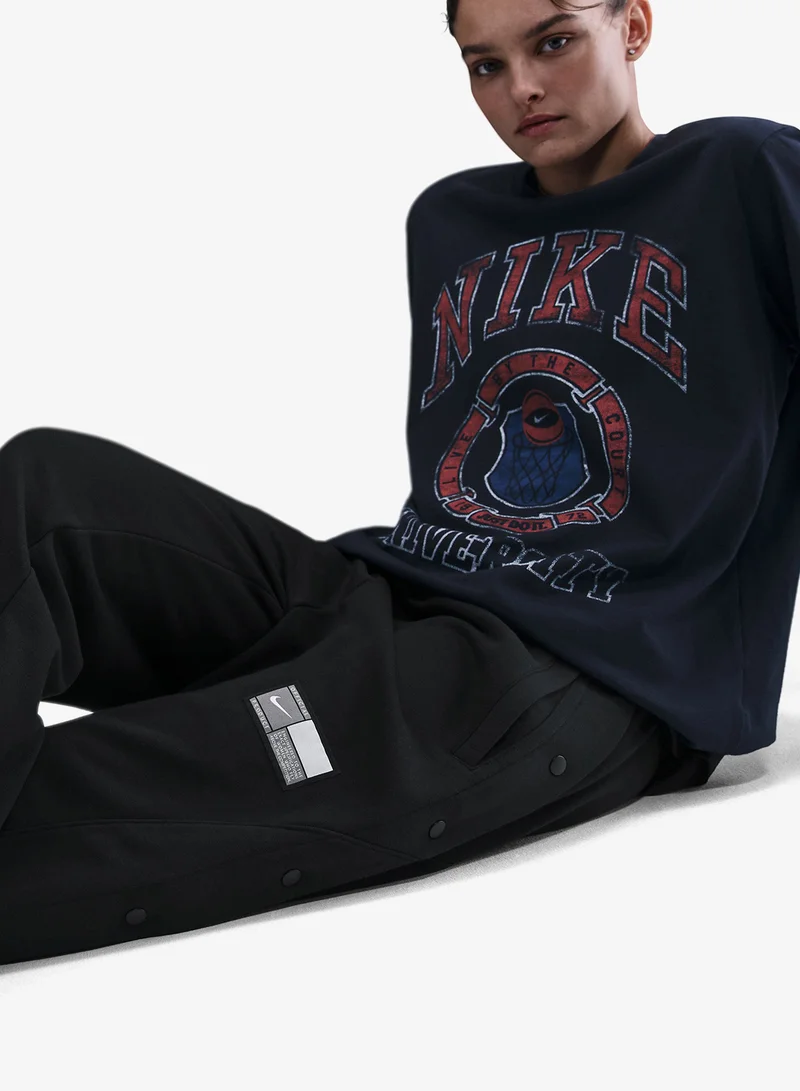 Nike  Dri-Fit Fleece Tearaway Seasonal Pants for Women | Best Price UAE