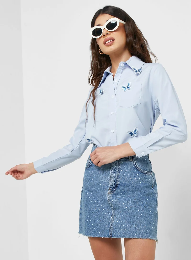 جينجر قميص مطرز بفراشة