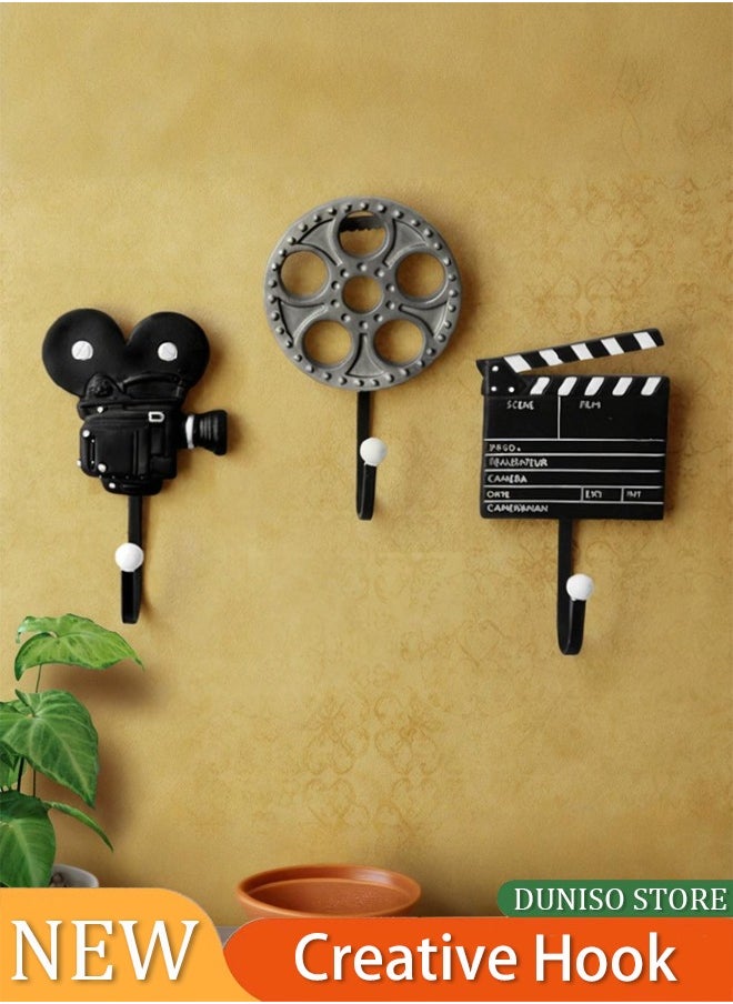 إسكدنيا 3 Pack Self Adhesive Hooks, Decorative Vintage Films Movie Reel, Clapper Board and Cinema Camera Resin Wall Coat Hooks for Hanging Coat, Scarf, Bag, Towel, Clothes, Short Sleeve ,Shirt Suit, Hats an  - Image 1