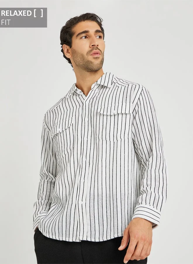 ستايلي قميص بأكمام طويلة مخطط مصبوغ بالخيوط بقصة مريحة وجيوب بقلاب