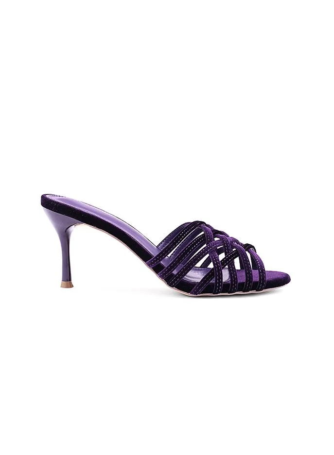 أيقون Night Purple heel slipper with elegant textured surface.