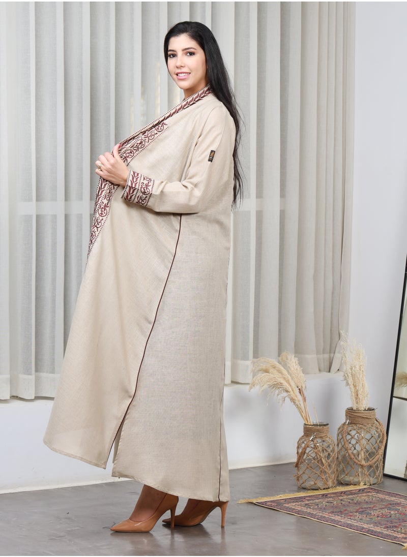 Gaiyda - Beige abaya distinguished by brown thread embroidery on the sleeves, collar and cuffs - Image 1