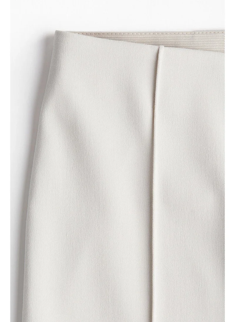 H&M Flared crease-leg trousers