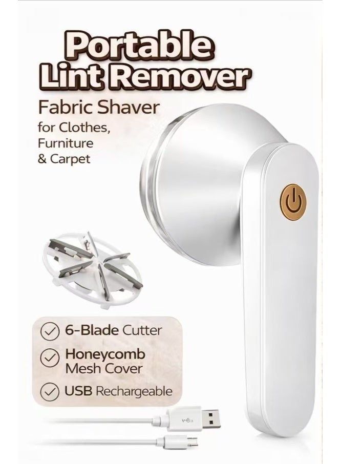 Portable lint remover, featuring a 6-blade cyclone head, is gentle on clothes and effectively removes lint from them. - Image 1