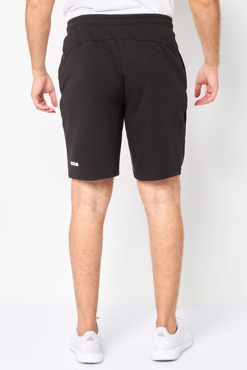 PUMA Men Sportswear Fit 9 Inseam Outdoor Shorts, Black - Image 4