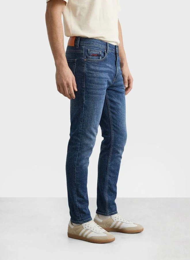 ذا انديان كراج كو Men Slim Fit Solid Jeans