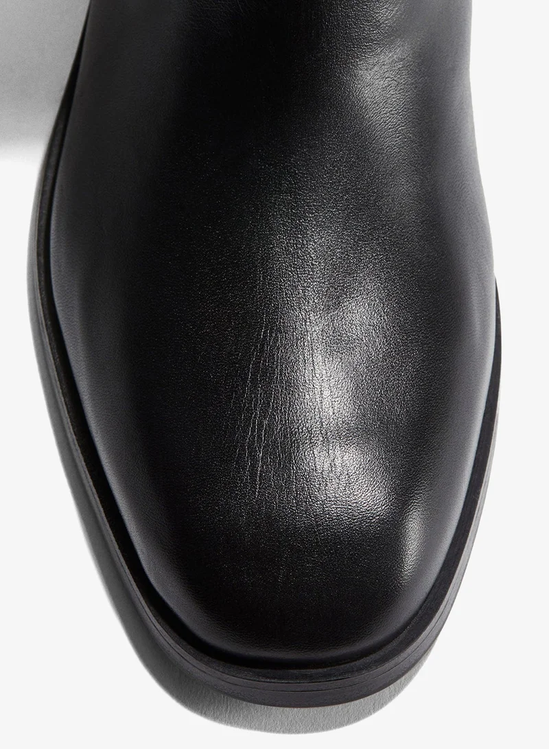 اتش اند ام حذاء جلد بساق يصل للركبة