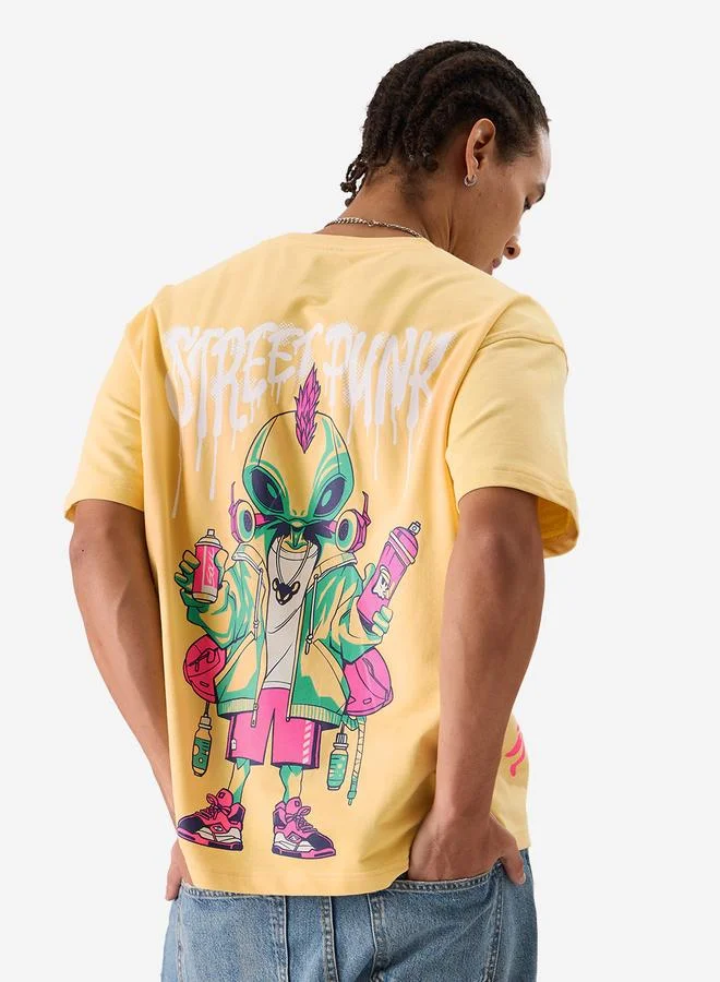 ذا سوليد ستور تيشيرت واسع مطبع بطبعة جرافيك