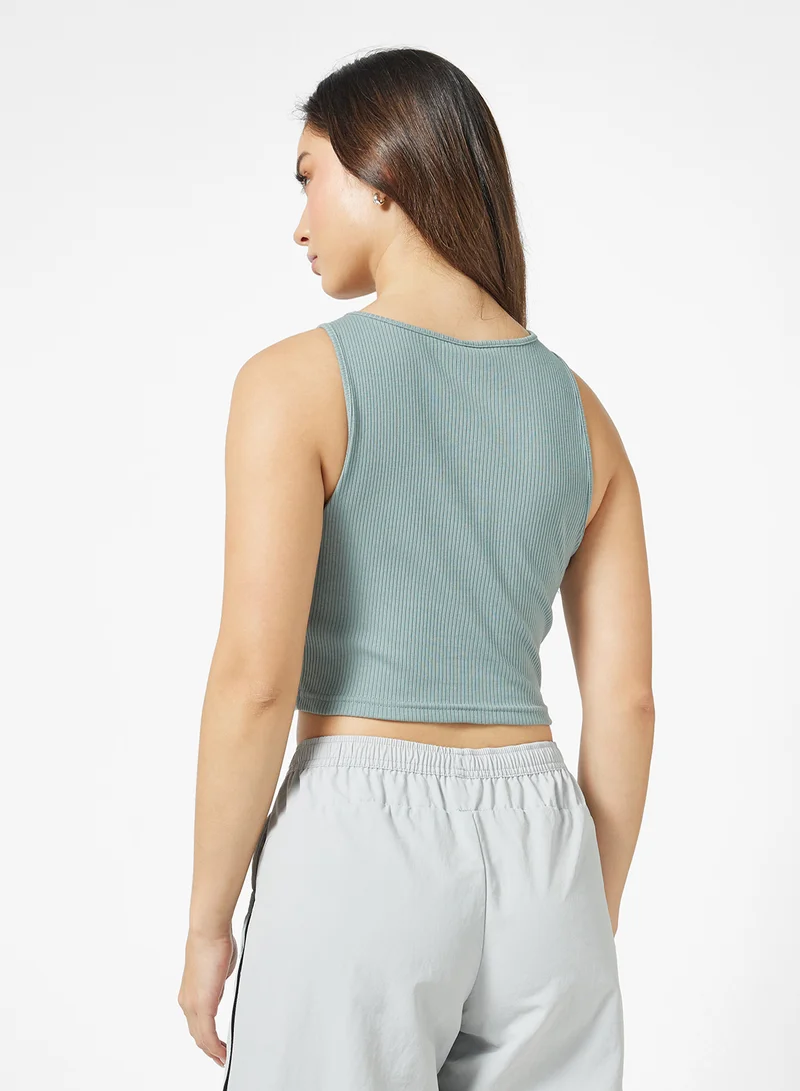 PUMA Wardrobe Essential Ribbed Cropped T-Shirt