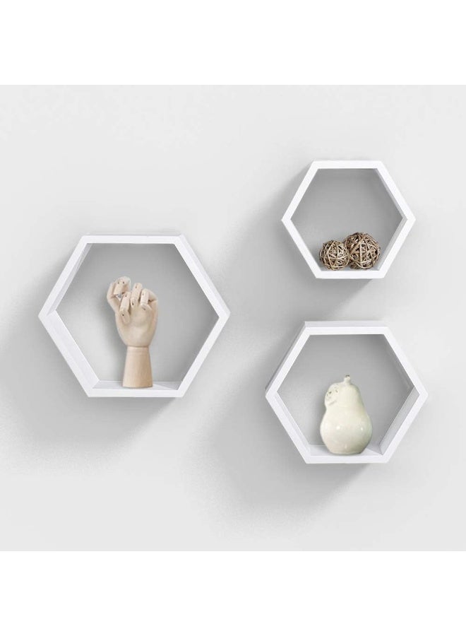 Modern hexagonal wall shelf set, 3 pieces for hanging decorations and organizing spaces. Stylish design for living room, bedroom, office, and entryway. - Image 1