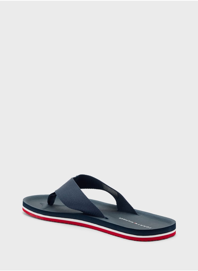 TOMMY HILFIGER - Monogram Beach Flip Flops - Image 1