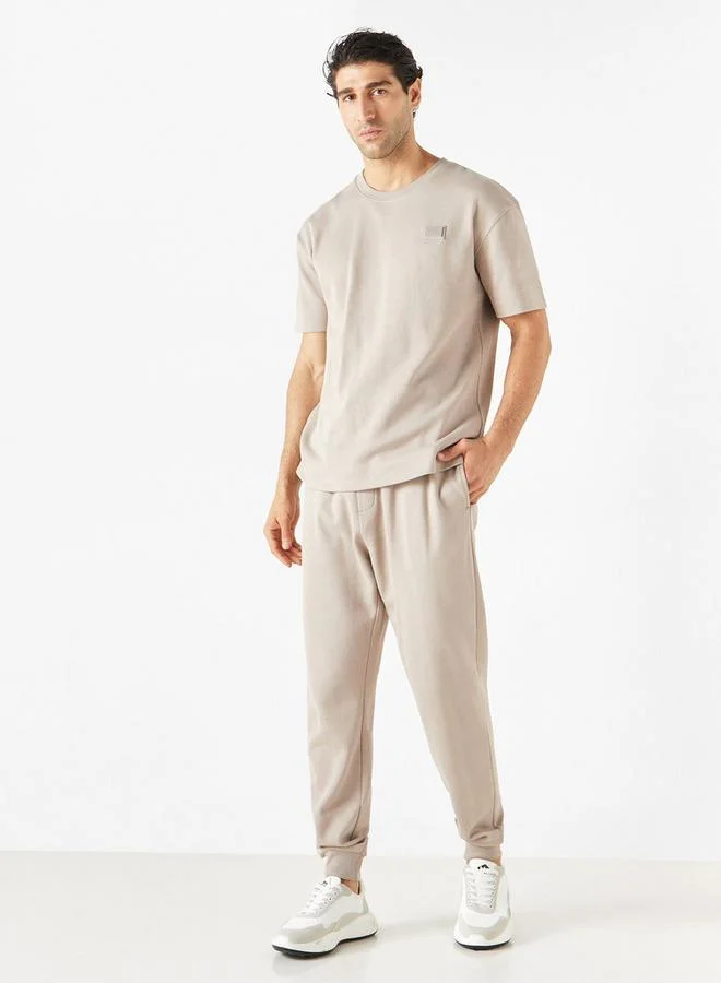 إمبيرور تيشيرت بأكمام قصيرة وتفاصيل زينة من إمبيرور