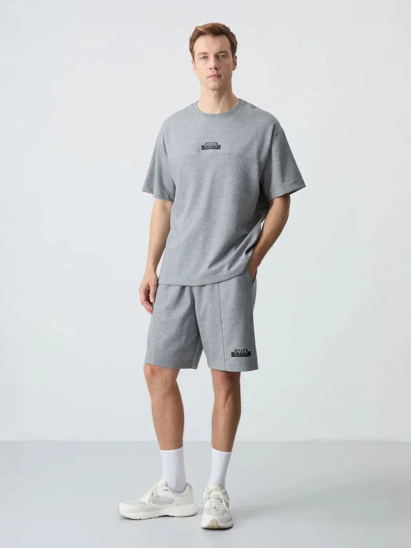 تومي لايف TOMMY Men's Oversized T-Shirt And Shorts Set