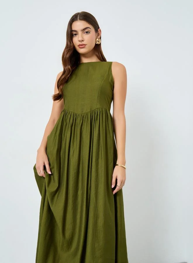 مكسيم كريشن فستان ميدي سادة بدون أكمام