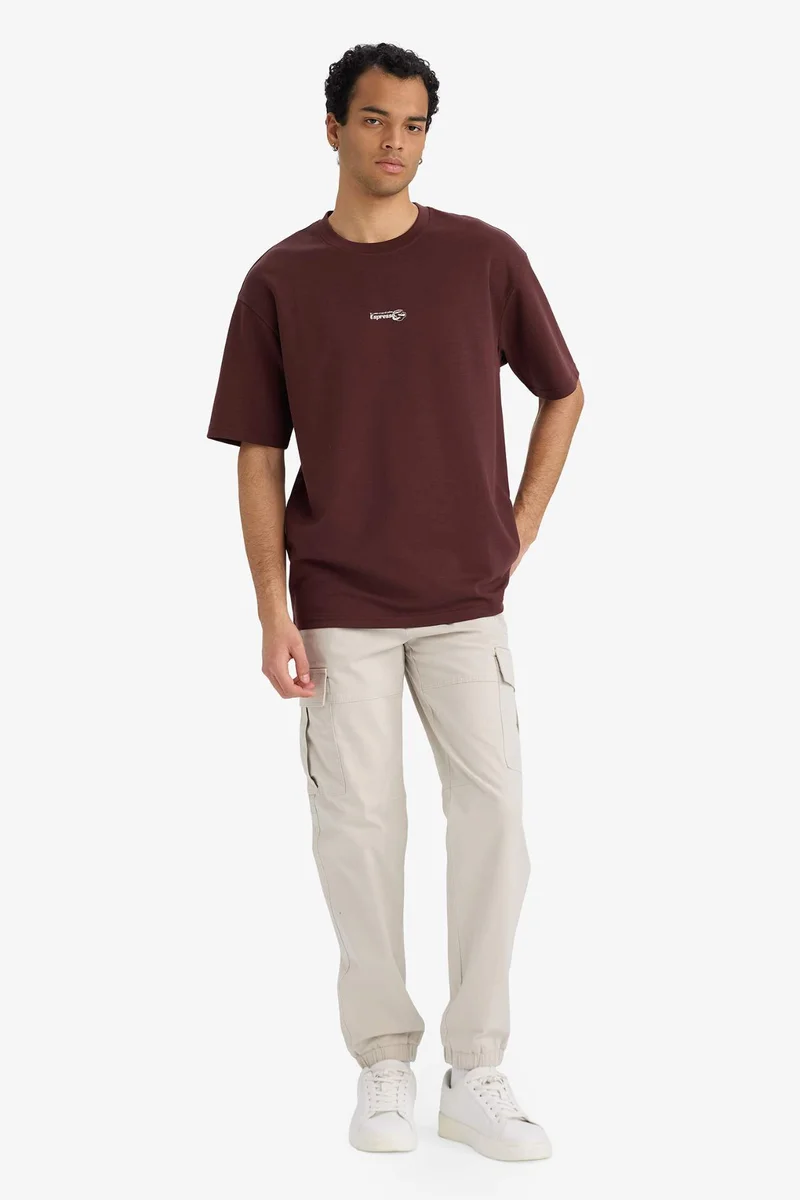 ديفاكتو Boxy Fit Crew Neck Short Sleeve T-Shirt