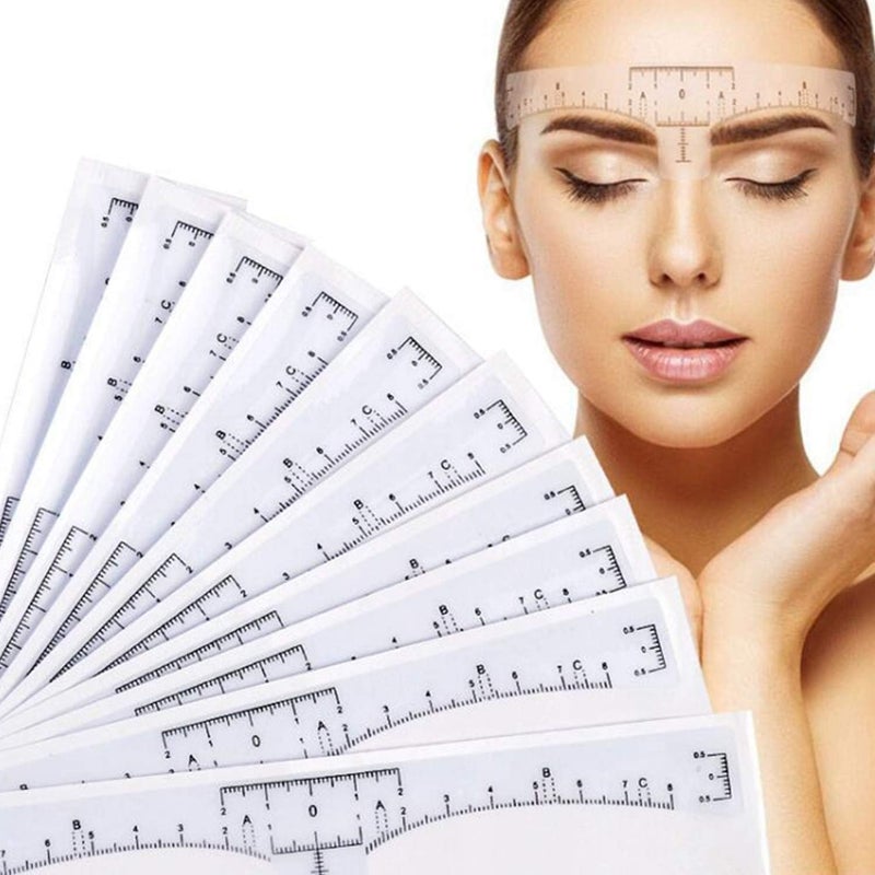 أمزويا 100 قطعة من قوالب مسطرة الحواجب، ملصق مسطرة حواجب شفاف قابل للاستخدام مرة واحدة، قالب لتشكيل وتلوين ورسم الحواجب بالمايكروبليدنج، أداة قياس وتشكيل ورسم الحواجب - Image 1