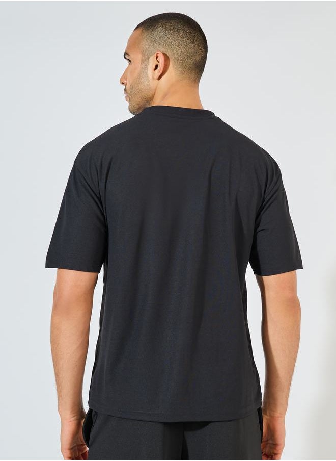 Styli - Oversized Slogan Training T-Shirt with Pintuck Detail - Image 1