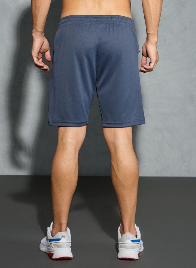 تكنوسبورت شورت رجالي تكنوسبورت بقصة ضيقة سادة مع تقنية تكنو دراي - Image 3