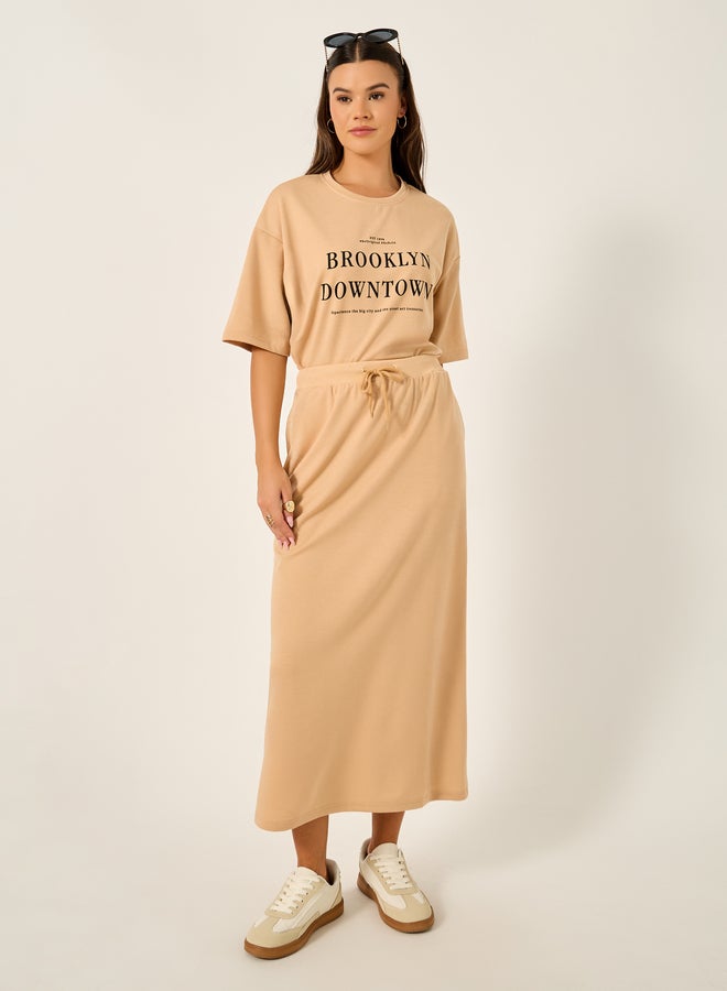 Styli Oversized Graphic Print T-Shirt and Midi Skirt Co-Ords  - Image 3