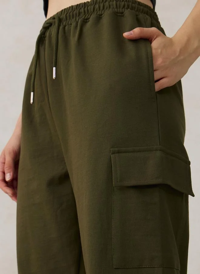 Outzidr  Olive Cargo Pocket Wide Leg Joggers for Women | Best Price UAE