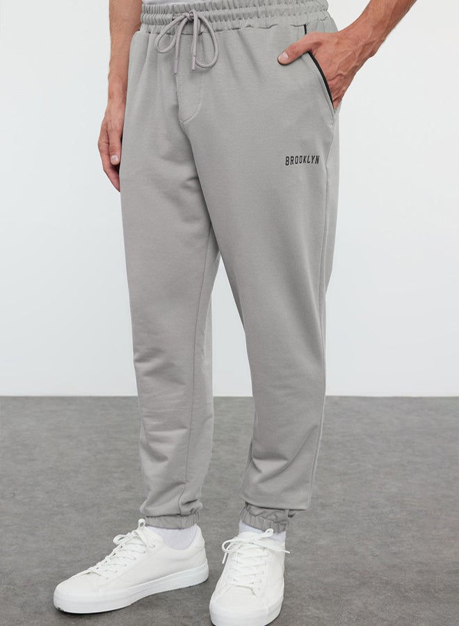 trendyol Gray Regular Fit Printed Elastic Leg Sweatpants TMNSS22EA0121 - Image 1
