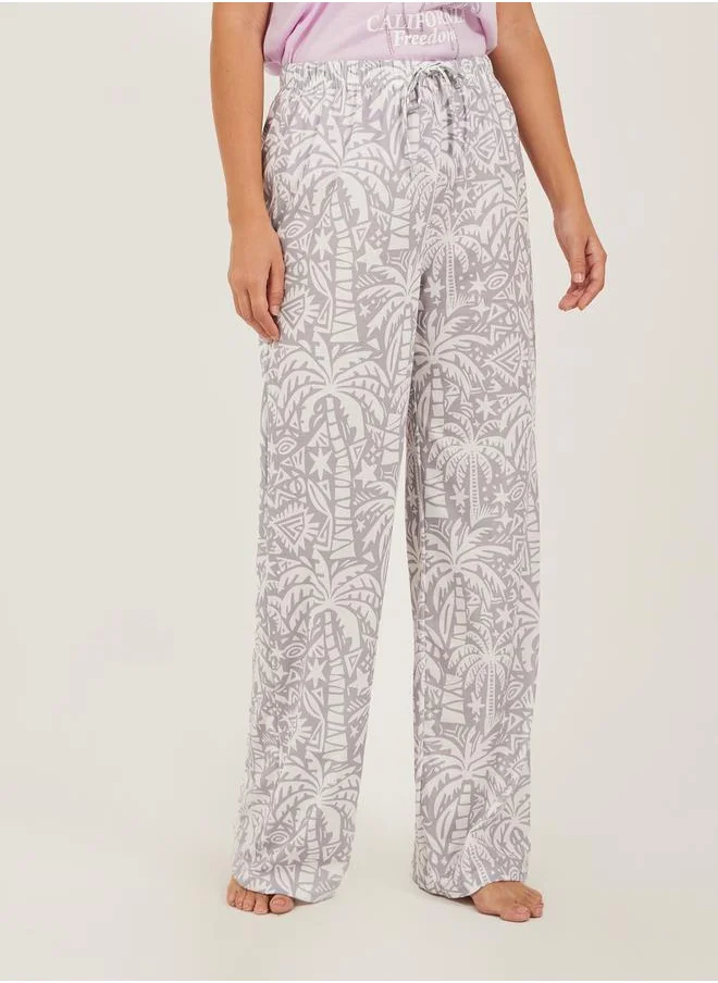 ستايلي Palm Graphic Print Dropped Shoulder T-Shirt and Pyjama Pants Set