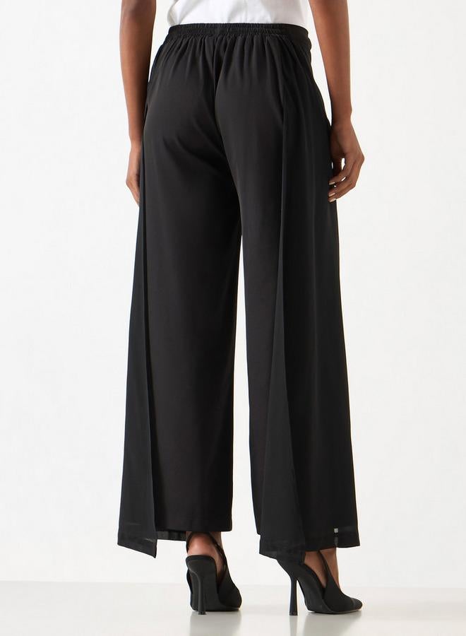 تواكستريمز بنطلون سادة بخصر مطاطي وتفاصيل متداخلة من توإكستريمز - Image 3