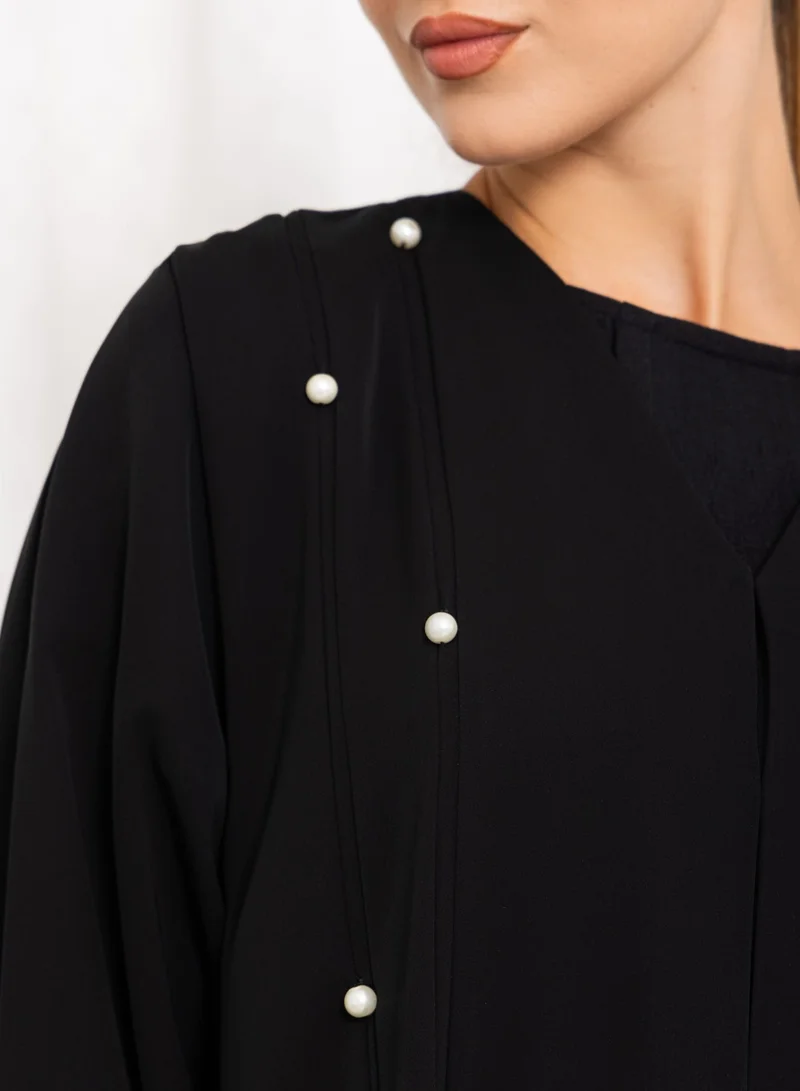 Nikias Black nida with pleats and pearls