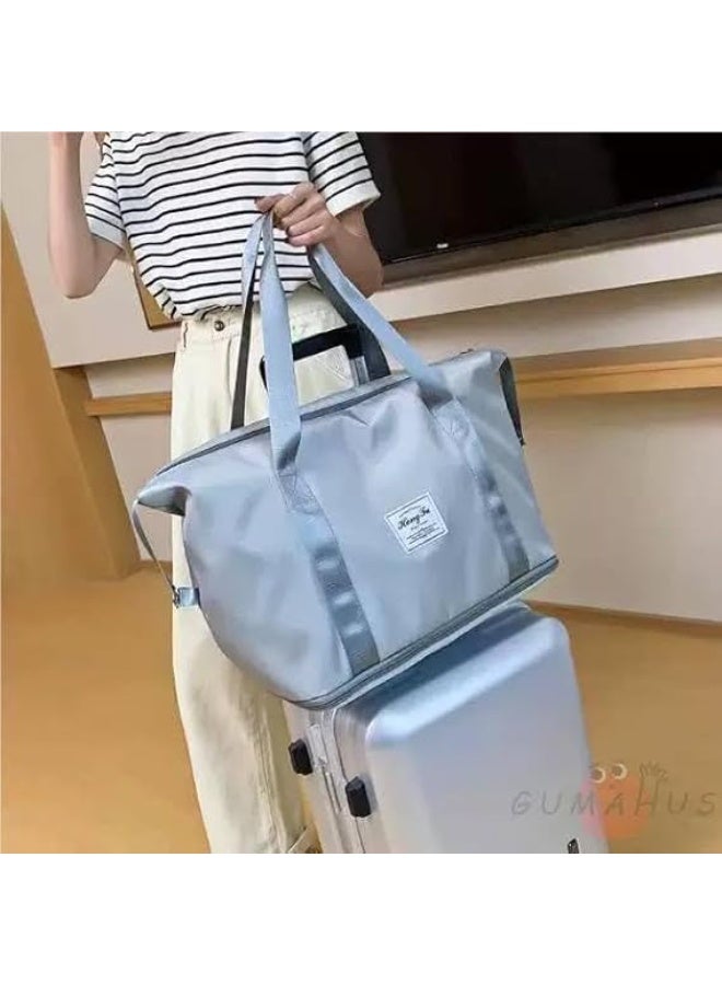 A versatile, foldable, waterproof travel bag with a bottom expansion joint for increased capacity, suitable for trips, the gym, and easily carrying travel essentials. - Image 1